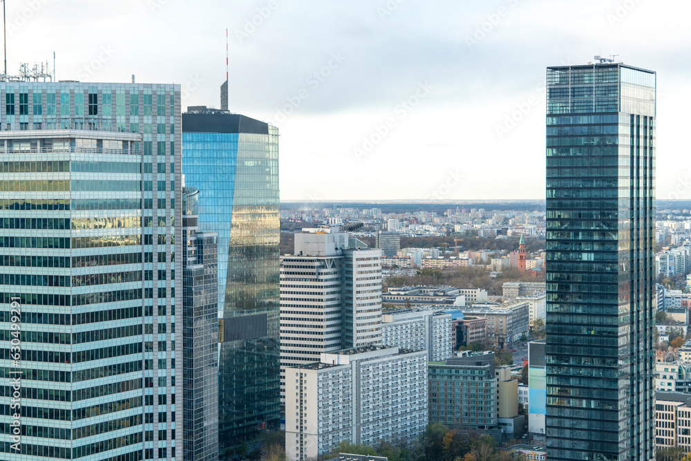 Skyline of the city center with modern business glass towers and hotels, Warsaw, Poland