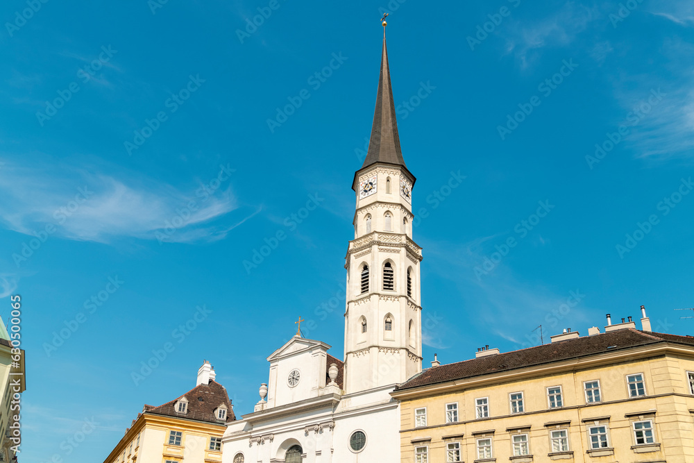 St. Michael's Church at Michaelerplatz square with blue sky, Vienna, Austria