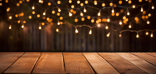 Empty Wood table top with decorative outdoor string lights hanging on tree in the garden at night time. fairy lights. Empty wood table top with blur bokeh light background.digital ai