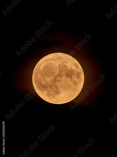 Full Orange Moon movement across the sky