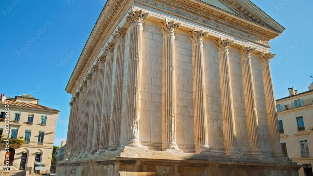 The Roman temple in Nimes, Occitanie, France on a sunny summer day. Antique temple decorated with columns and friezes in France.
The Roman temple in Nimes, Occitanie, France on a sunny summer day. Antique temple decorated with columns and friezes in France.