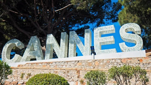 Cannes on the French Riviera, Cote d'Azur. Sign Cannes written with light bulbs on a top of a mountain in the Notre Dame d'Esperance church. 