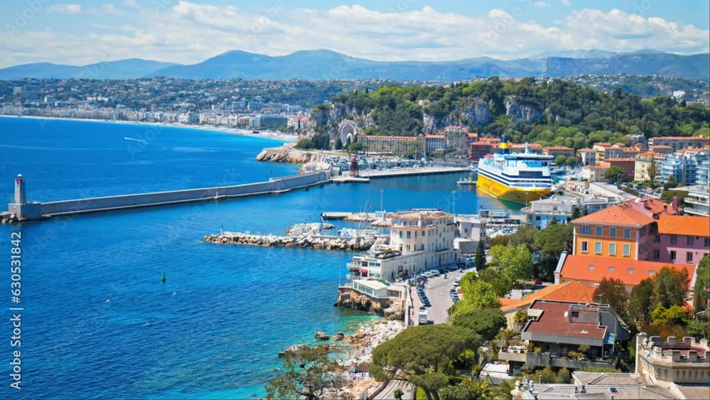 Stunning view of the Mediterranean Sea with the lighthouse in the harbor in Nice. Landscape with marina in South of France or the French Riviera Stunning view of the Mediterranean Sea with the lighthouse in the harbor in Nice. Landscape with marina in South of France or the French Riviera