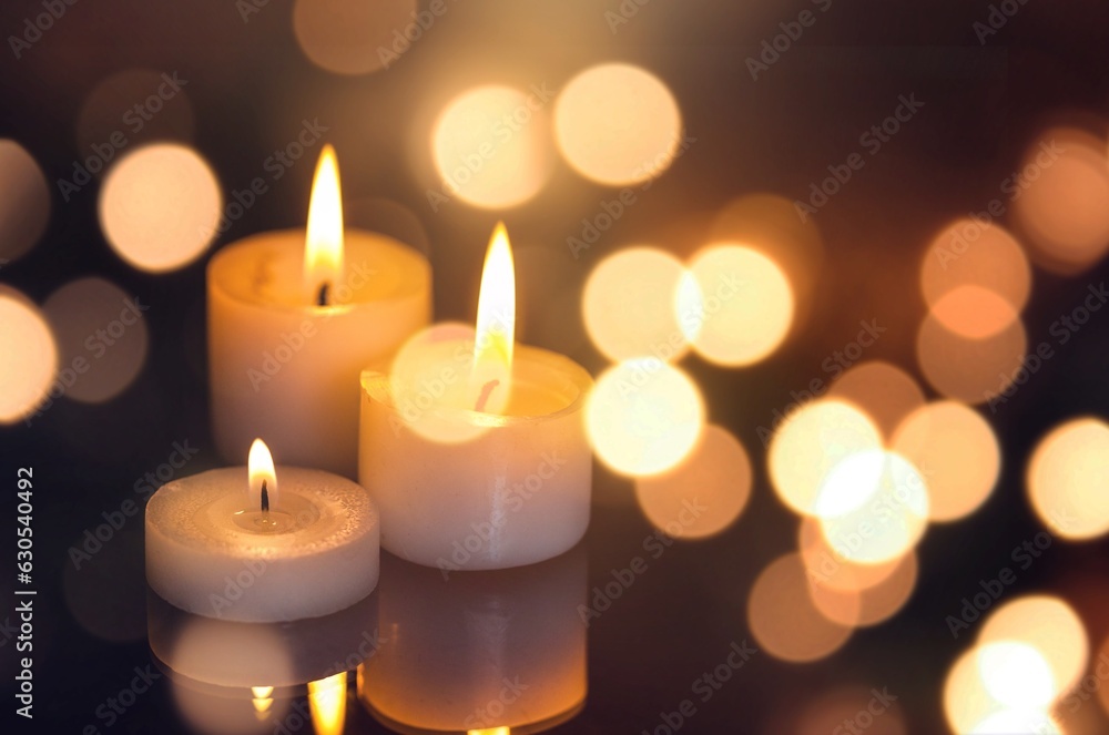 Beautiful aroma candle with fire on the desk Beautiful aroma candle with fire on the desk