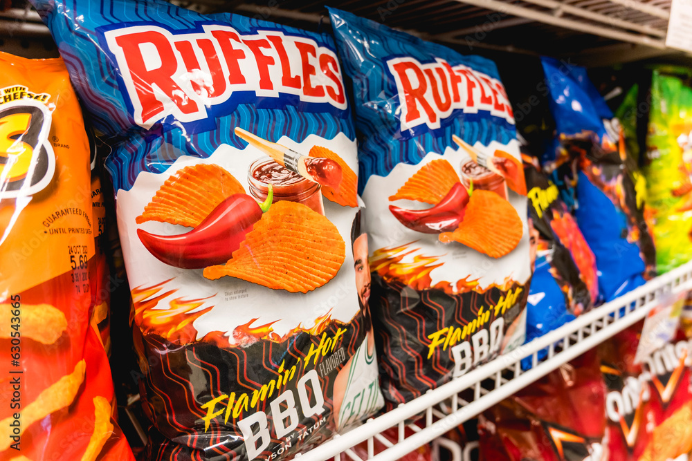Miami, Florida, USA - Aug 03, 2023: Ruffles Flamin Hot BBQ crinkle-cut ...