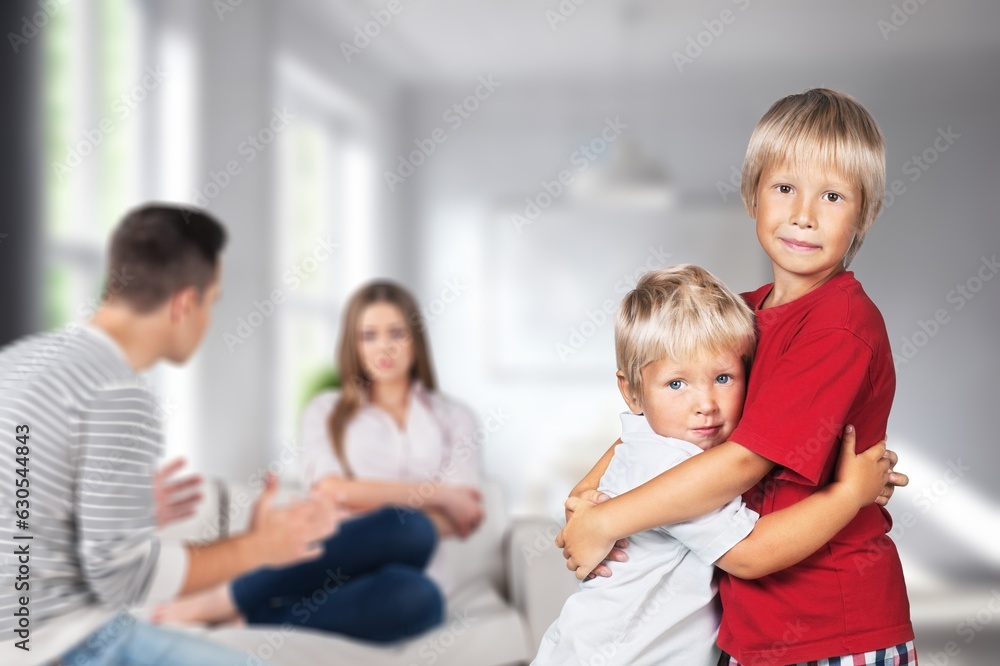 Sad child, fighting parents in living room Sad child, fighting parents in living room