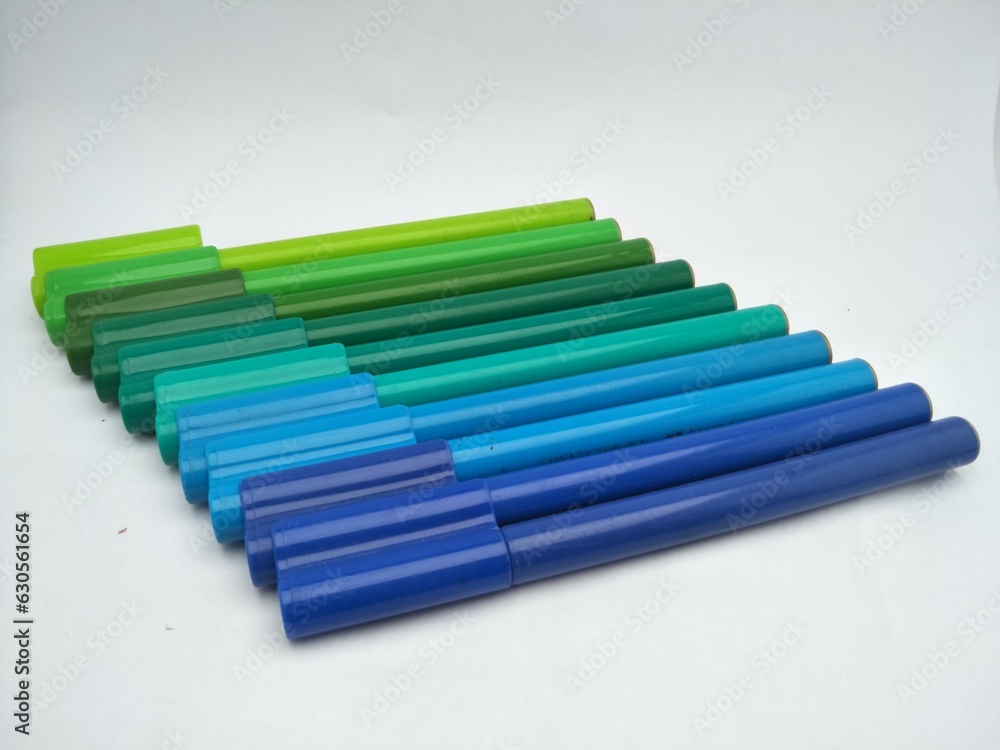 A collection of colored pens that are often used for drawing. The colors are arranged according to the gradation A collection of colored pens that are often used for drawing. The colors are arranged according to the gradation