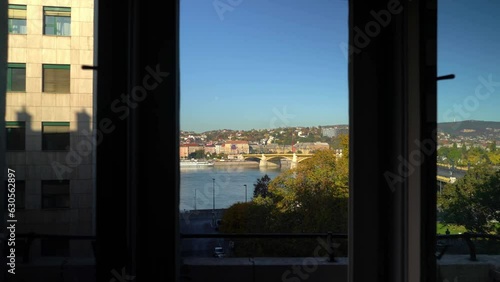 Street view through windows of an apartment overlooking Budapest Street, Jaszai Mari Square, Hungary photo