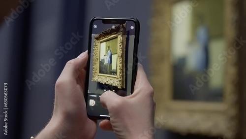 Capturing Art's Timeless Beauty: Enthusiastic Visitor Immortalises Vermeer's Masterpiece at Rijksmuseum with their Smartphone photo