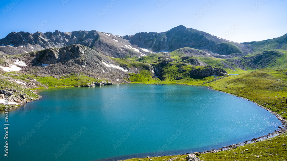 beautiful blue mountain lake. summer green mountains