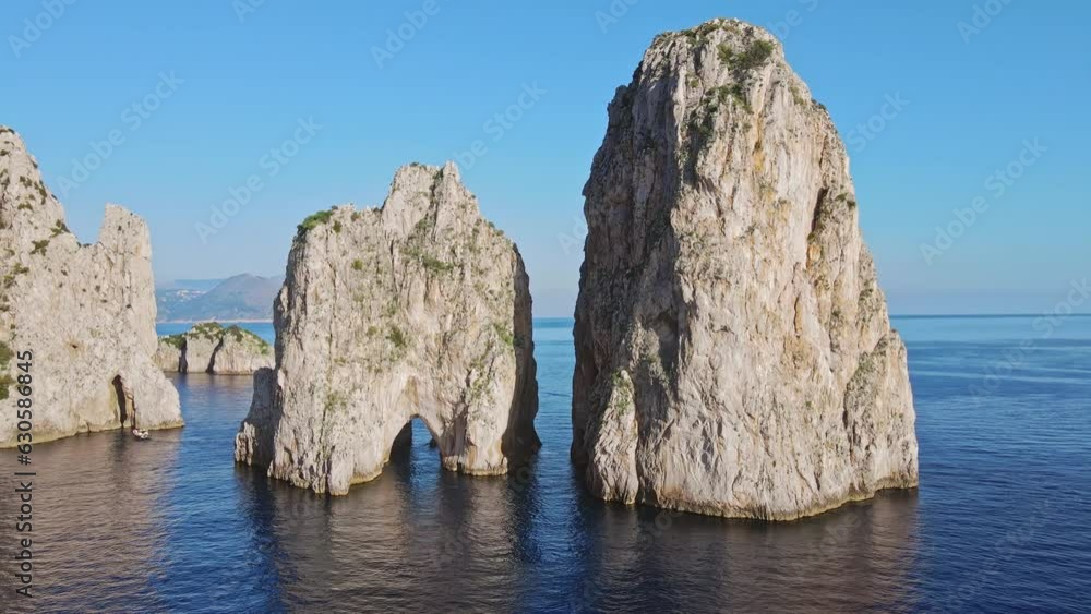 Aerial of Faraglioni, Amalfi coast, Italy on a sunny afternoon. Aerial of Faraglioni, Amalfi coast, Italy on a sunny afternoon.