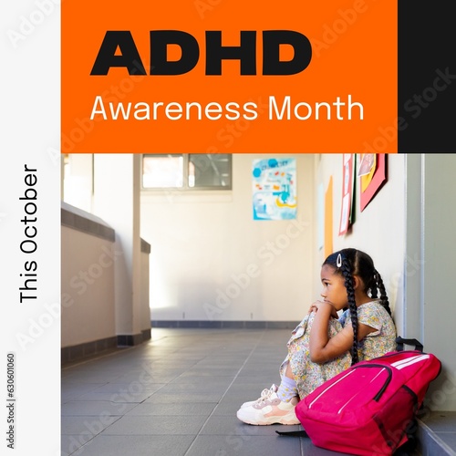 Adhd awareness month text on orange with sad biracial girl sitting in school corridor photo