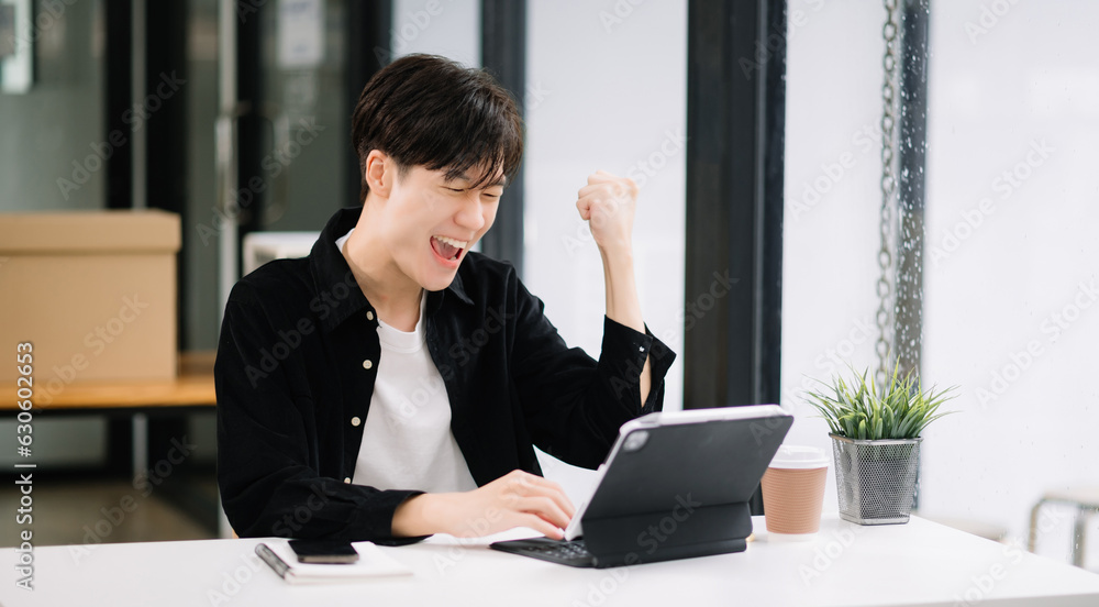 Asian businessman are delighted and happy with the work they do on their tablet, laptop and taking notes at office. Asian businessman are delighted and happy with the work they do on their tablet, laptop and taking notes at office.