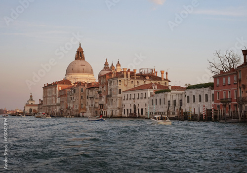 Historical buildings of Venice in the rays of the setting sun © Kateryna