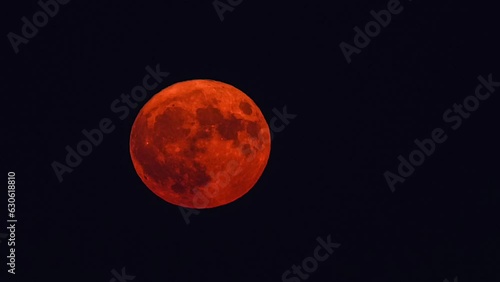 4K time lapse video during a bloody red moon sunrise called also sturgeon moon
