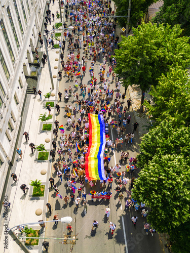 People carrying LGBT flag at rally in support of the European integration in Chisinau, Moldova photo