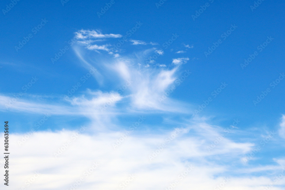 View of the blue sky with clouds. Background of the sky. View of the blue sky with clouds. Background of the sky.