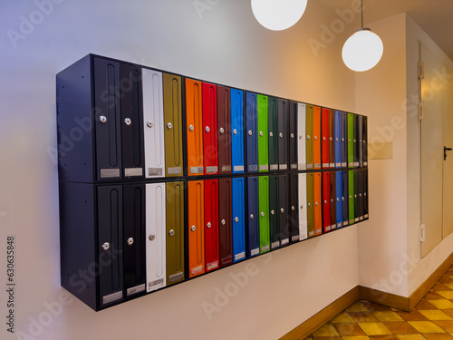 Group of colorful mail boxes in Spanish apartment's building