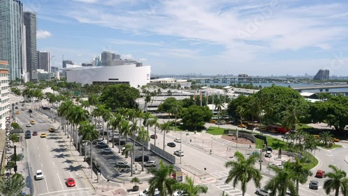 Drone view of busy streets of Miami stretching from Downtown to Bayfront Park, showcasing iconic Kaseya Center and vibrant Biscayne Blvd. Cosmopolitan atmosphere of Miami Beach photo