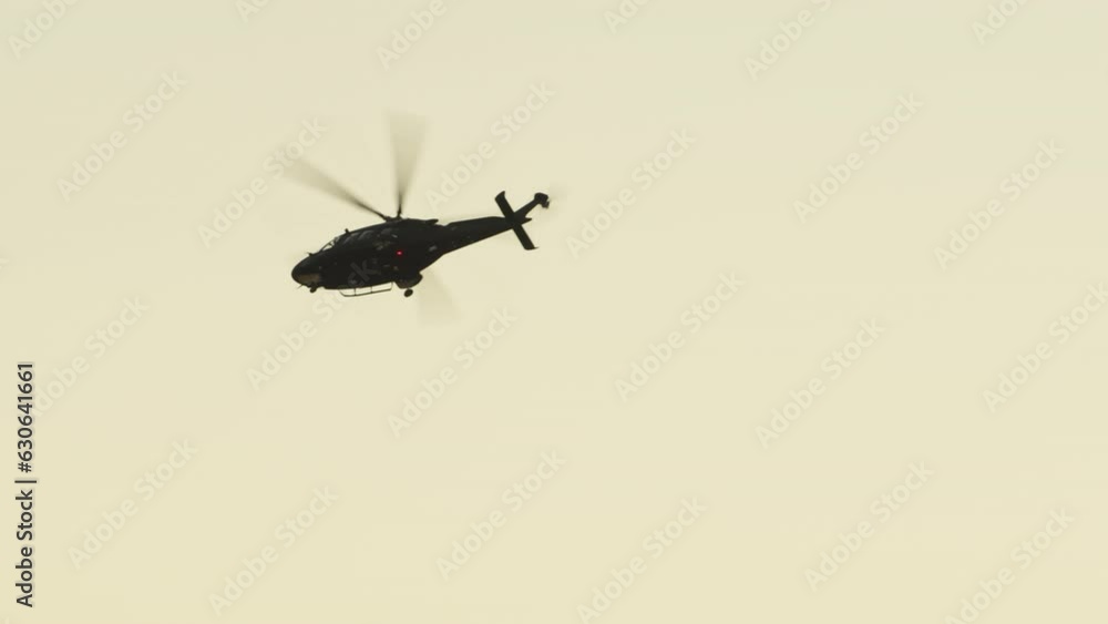 UH-169 Military Helicopter Flying in the sky UH-169 Military Helicopter Flying in the sky
