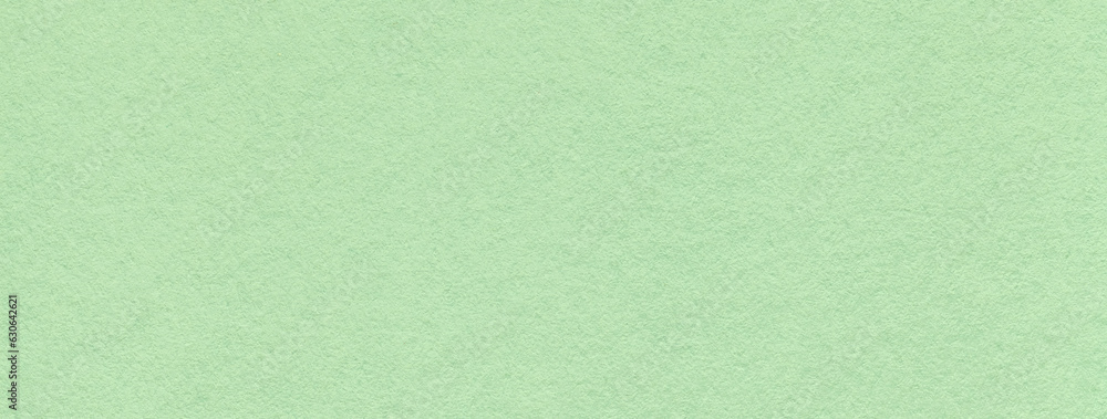 Texture of craft light green and mint paper background colors, macro. Structure of vintage kraft olive cardboard. Texture of craft light green and mint paper background colors, macro. Structure of vintage kraft olive cardboard.