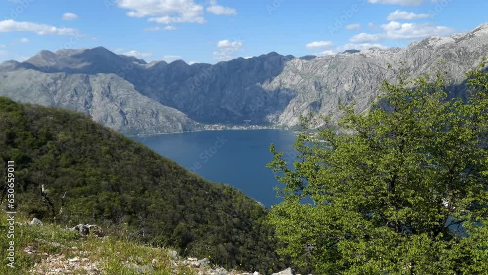 Beautiful mountain range by the sea, establishing shot, Kotor Bay, Montenegro Beautiful mountain range by the sea, establishing shot, Kotor Bay, Montenegro