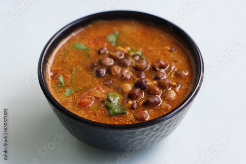 Kalya Vatanyachi Usal, kala vatana sambar or aamti, curry made with dried black peas in gravy with roasted coconut, onion and spice, Indian food