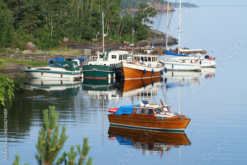 Boats in the harbour at the Ulko-Tammio Island in Eastern Gulf of Finland National Park which is declared to phone free area in order to take social media break while on vacation in outdoors.
