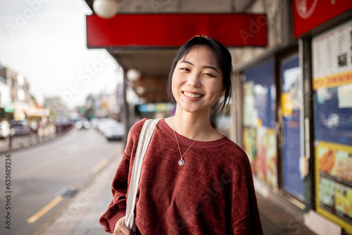 Young adult asian woman exploring the inner west urban streets of Sydney