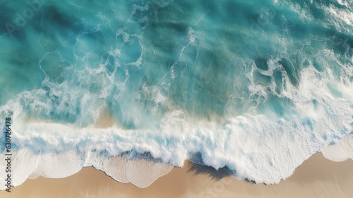An aerial view of a beach with waves