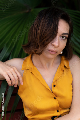 Young woman in yellow dress