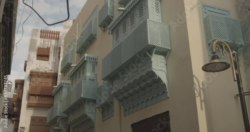 Old houses with wooden mashrabiya in al-Balad quarterJeddah  Saudi Arabia photo