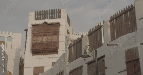 Old houses with wooden mashrabiya in al-Balad quarterJeddah  Saudi Arabia photo