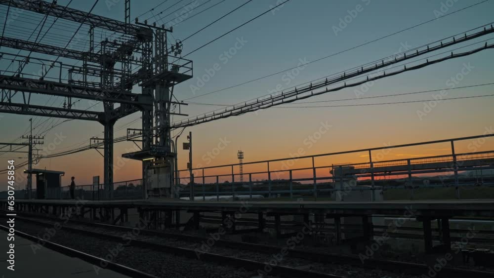 A rural station and substation dyed in darkness from a beautiful autumn sunset A rural station and substation dyed in darkness from a beautiful autumn sunset