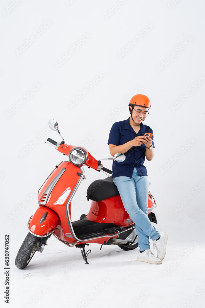 full body photo of a man wearing a hairdresser and driving a motorbike full body photo of a man wearing a hairdresser and driving a motorbike