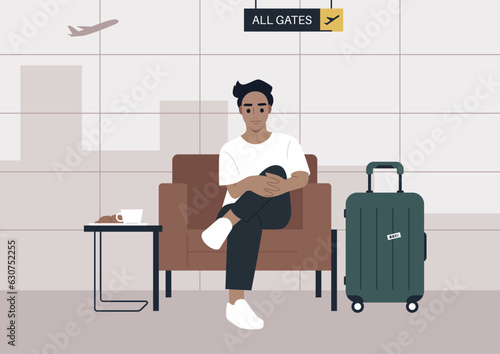 An airline passenger of the premium class biding time in a lounge area before their flight