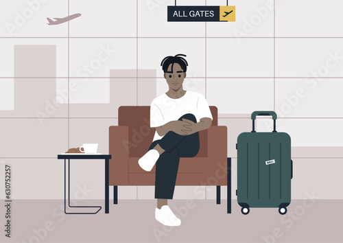 An airline passenger of the premium class biding time in a lounge area before their flight