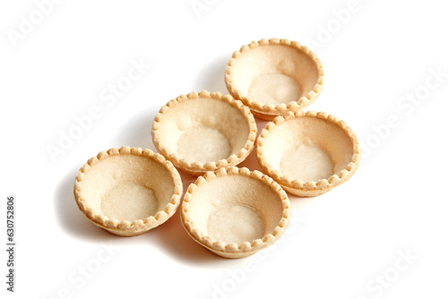 Billede på lærred Unfilled tartlet shells isolated on white background
