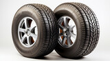 Winter and summer auto tires. A pair of tires. Wheels of vehicles stacked up. lone automobile tires on a white background