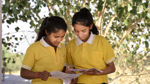 Happy Indian student schoolgirl wearing school uniform. closeup, Education concept.