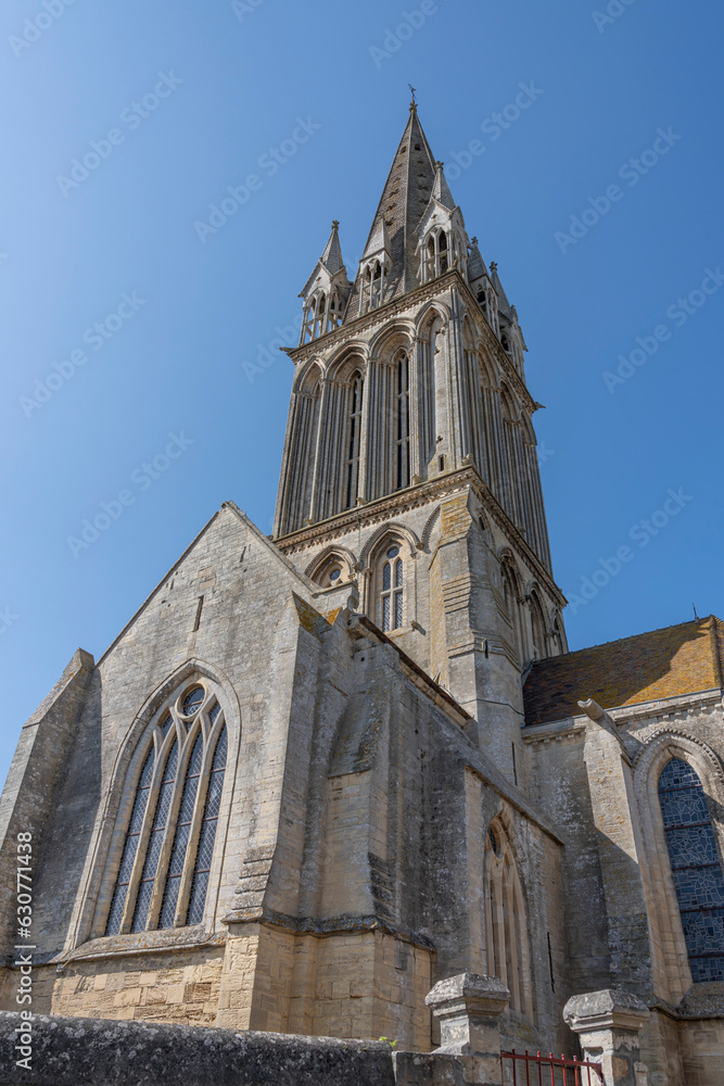 Langrune-Sur-Mer, France - 07 18 2023: View of the facade of the St. Martin's Church from the road.