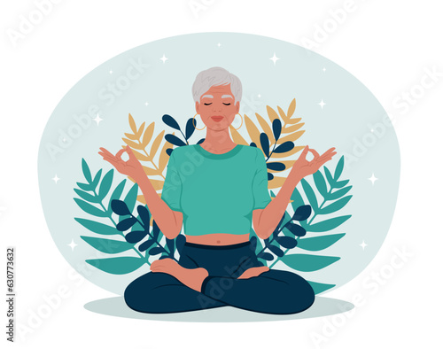 Healthy Aging month. Elderly woman with closed eyes meditating in yoga lotus posture.