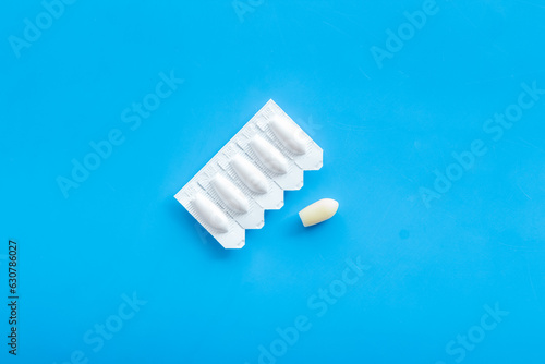 Pharmacy concept. Rectal suppositories in white blister, top view