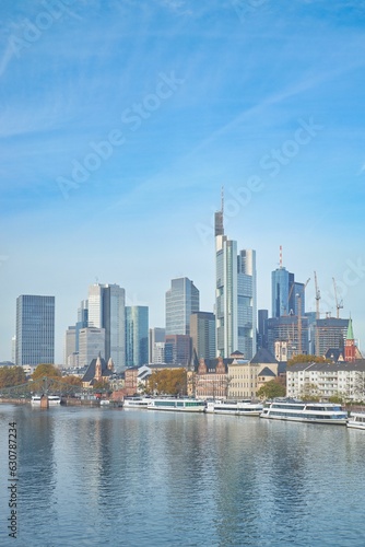 the large body of water in front of a city with high rise buildings
