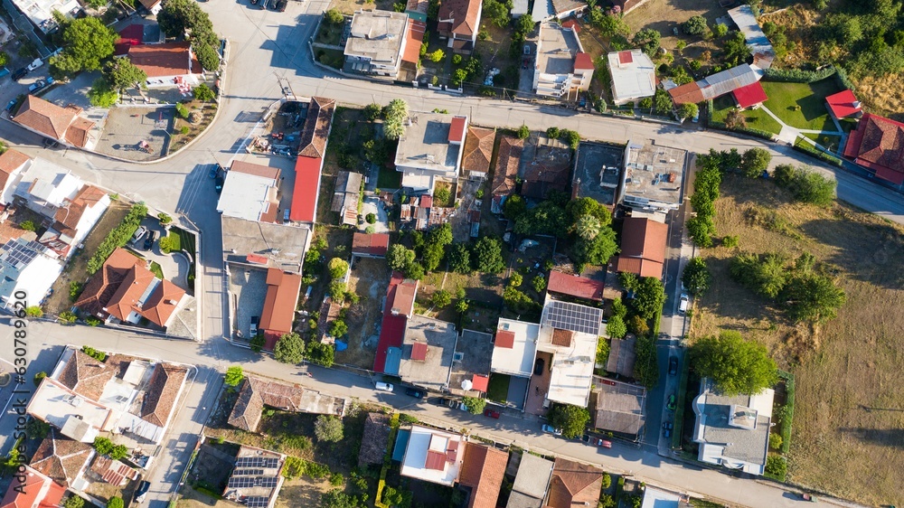 Aerial top view of residential houses on a sunny day
