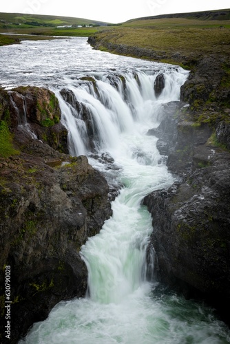 Breathtaking view of a majestic Kolufoss waterfall at Kolugljufur canyon in Iceland