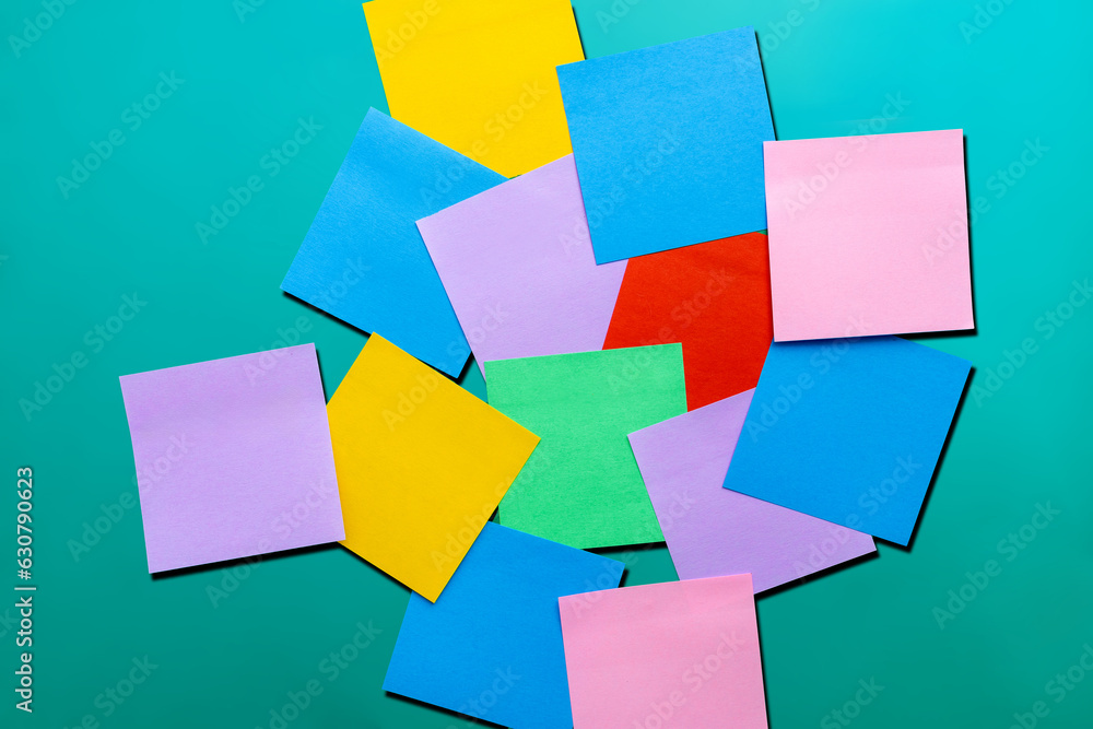 colored sheets to write on a blue background, with copy space, back to school colored sheets to write on a blue background, with copy space, back to school
