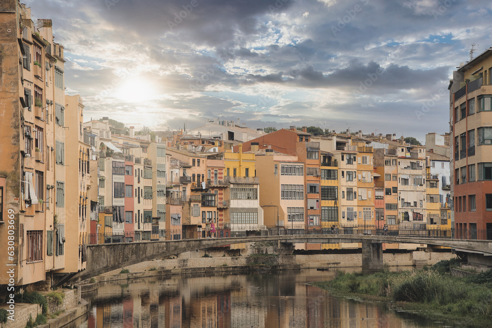 Sunset at the colorful houses in Girona, Catalonia, Spain.