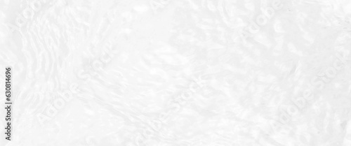 White water with ripples on the surface, defocus blurred transparent white colored clear calm water surface texture, water panoramic banner background, white water texture, aqua surface with rings.