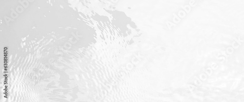 White water with ripples on the surface, defocus blurred transparent white colored clear calm water surface texture, water panoramic banner background, white water texture, aqua surface with rings.
